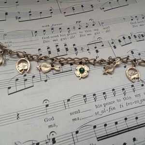 Goldtone Lucky Charm Bracelet with Green Gemstone